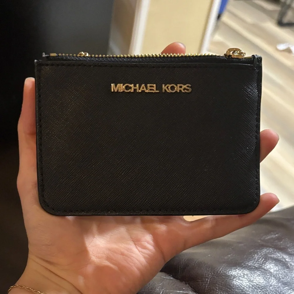 Michael Kors Black Pouch with Gold Accents